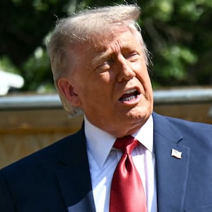President Donald Trump speaks to the press near the construction site of his proposed ballroom at the White House in Washington, DC, on May 19, 2026.