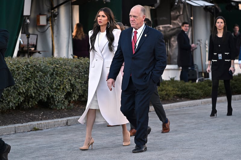 US Secretary of Homeland Security Kristi Noem (L) and White House 'border czar' Tom Homan