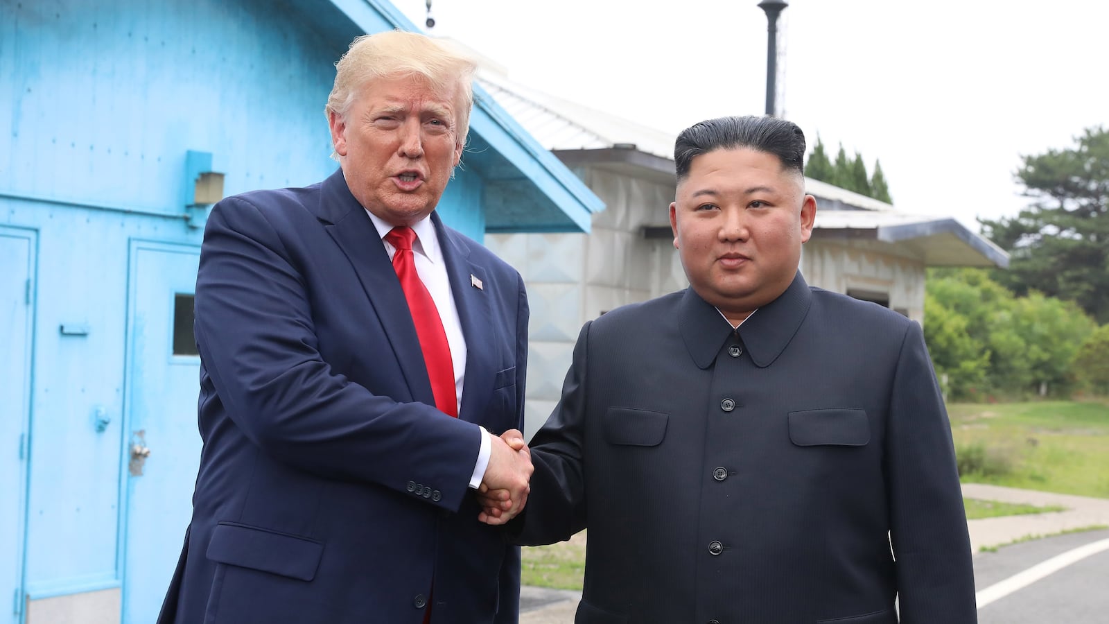 PANMUNJOM, SOUTH KOREA - JUNE 30 (SOUTH KOREA OUT): A handout photo provided by Dong-A Ilbo of North Korean leader Kim Jong Un and U.S. President Donald Trump inside the demilitarized zone (DMZ) separating the South and North Korea on June 30, 2019 in Panmunjom, South Korea. U.S. President Donald Trump and North Korean leader Kim Jong-un briefly met at the Korean demilitarized zone (DMZ) on Sunday, with an intention to revitalize stalled nuclear talks and demonstrate the friendship between both countries. The encounter was the third time Trump and Kim have gotten together in person as both leaders have said they are committed to the "complete denuclearization" of the Korean peninsula. (Handout photo by Dong-A Ilbo via Getty Images/Getty Images)