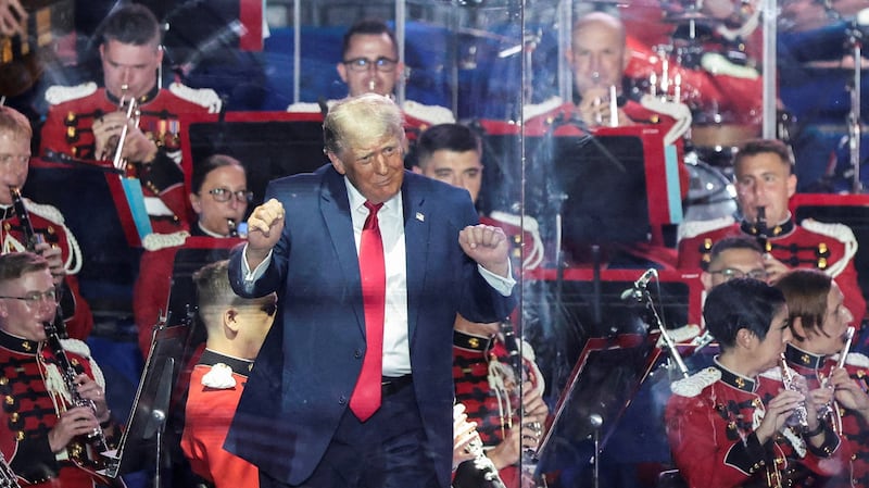 U.S. President Donald Trump gestures as the United States Marine Band performs at a rally to kick off the Great American State Fair in celebration of the 250th anniversary of U.S. independence on the National Mall in Washington, D.C., U.S., June 24, 2026. REUTERS/Evelyn Hockstein REFILE - QUALITY REPEAT     TPX IMAGES OF THE DAY