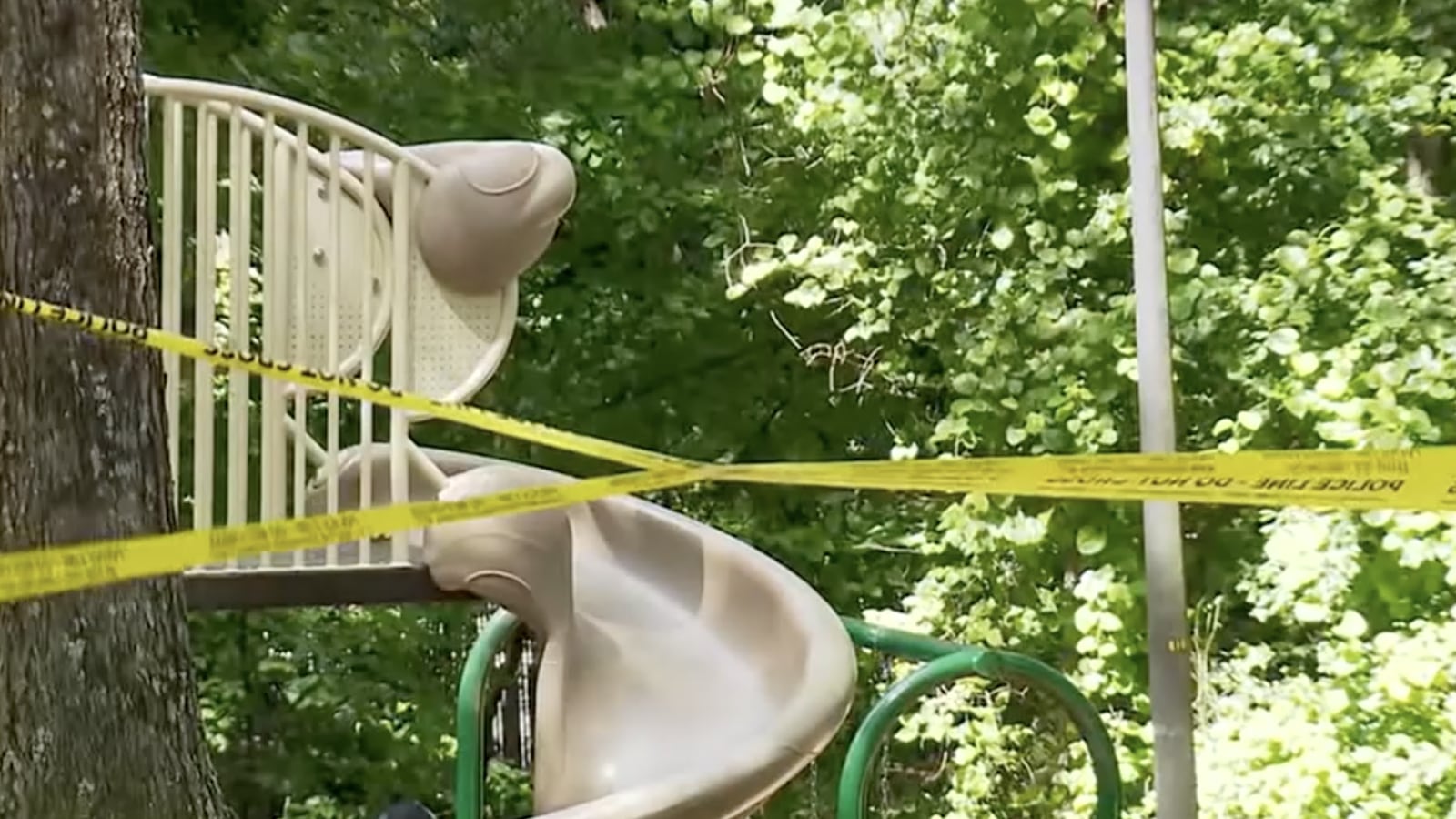 Playground with police tape.