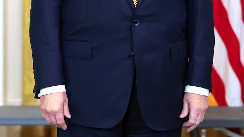 President Donald Trump stands by during a military mothers celebration in the East Room of the White House on May 6, 2026 in Washington, DC. President Trump and the first lady honored America's military mothers at the event ahead of Mother's Day.