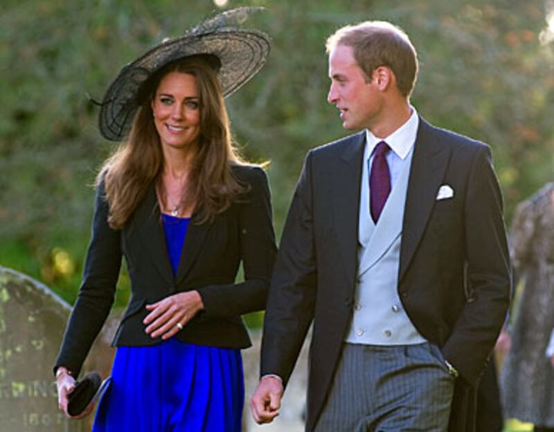 articles/2010/11/16/prince-william-kate-middleton-engaged-photos/william-kate-engaged-gal-launch_aqd1ux