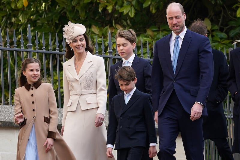 Britain’s Princess Charlotte, Kate, the Princess of Wales, Prince George, Prince Louis, and William, the Prince of Wales, are photographed as they arrive to attend the Easter Matins Service at St. George’s Chapel in 2026.