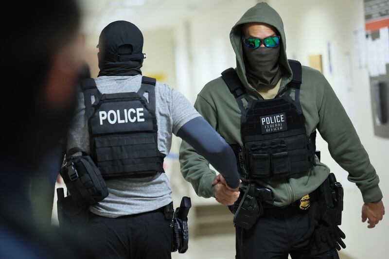 Federal agents patrol the halls of immigration court