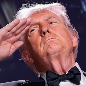 U.S. President Donald Trump salutes during the annual White House Correspondents' Association dinner in Washington, D.C., U.S., April 25, 2026.