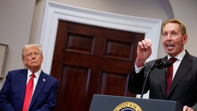 Oracle co-founder, CTO and Executive Chairman Larry Ellison, accompanied by U.S. President Donald Trump