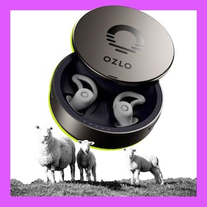 Headphones in front of sheep on a purple background