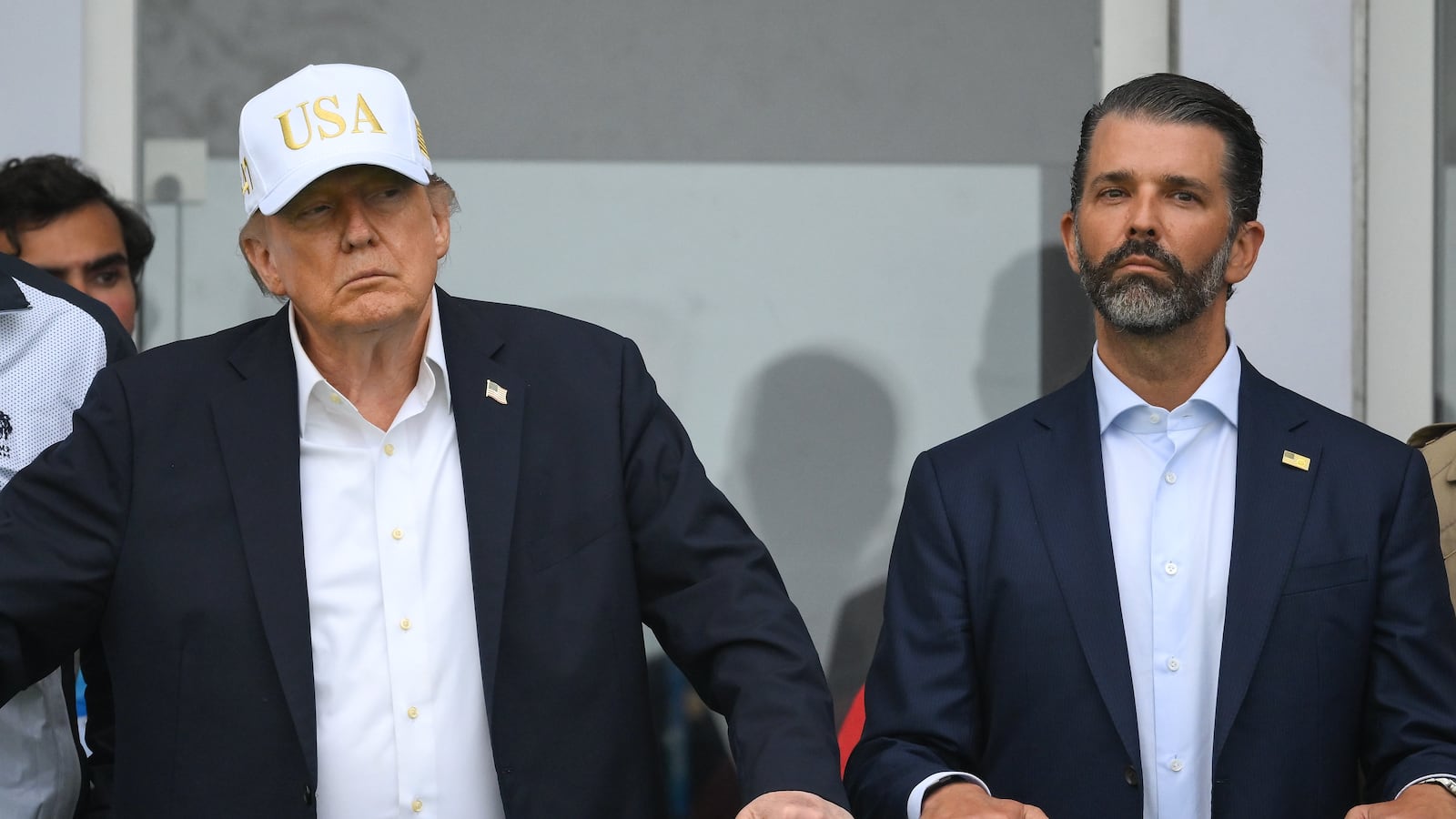 U.S. President Donald Trump, Eric Trump, left, and Executive Vice President of the Trump Organisation Donald Trump Jr, right, during day three of the Amgen Irish Open Golf Championship 2026 at Trump International Golf Links in Doonbeg, Clare.
