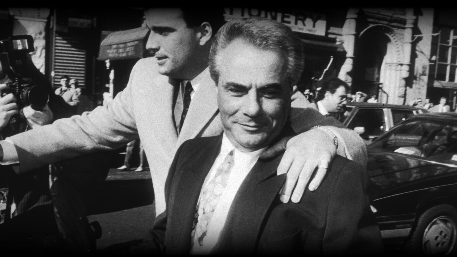 A black and white photo of John Gotti