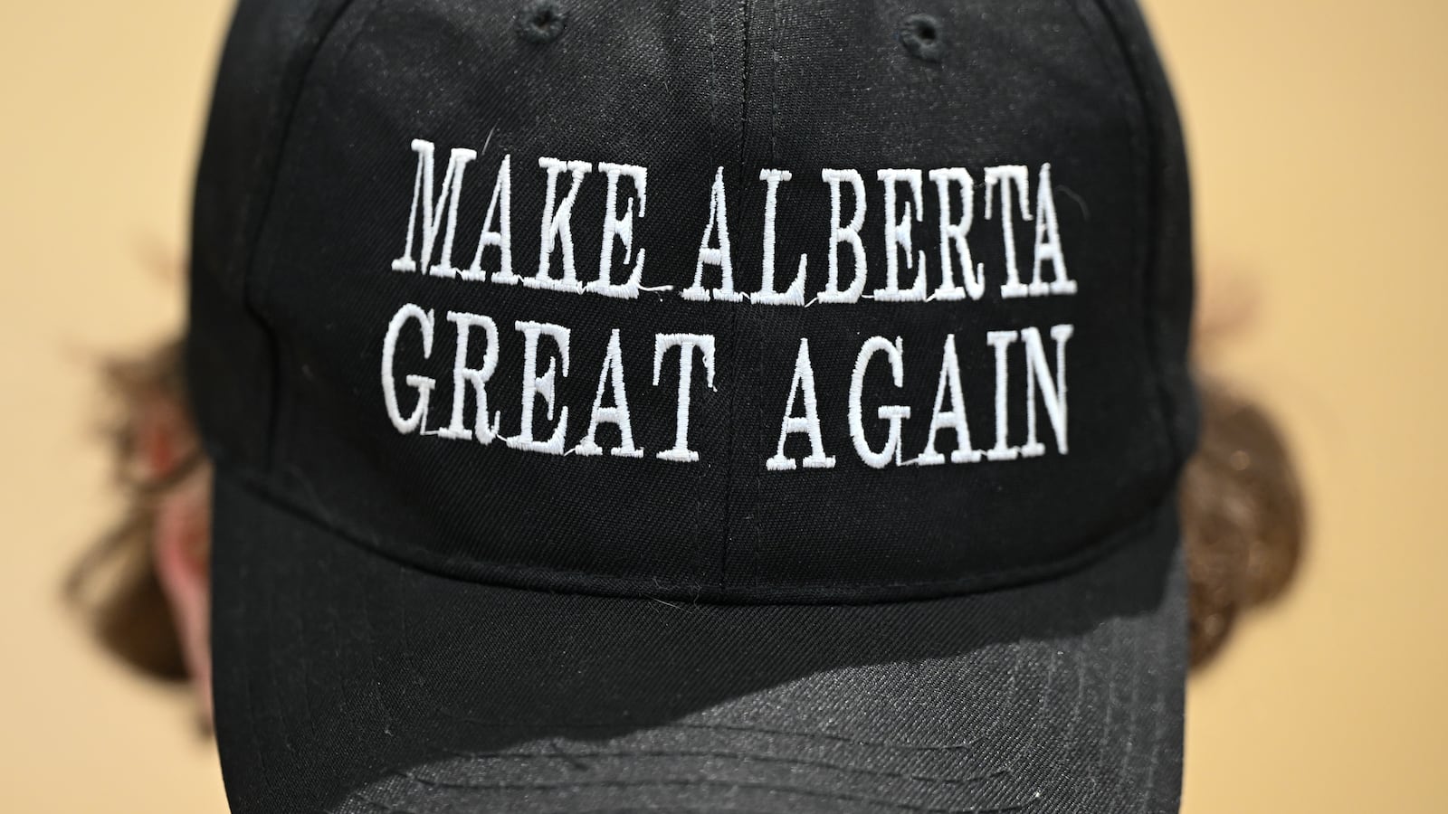 SHERWOOD PARK, CANADA MARCH 18:
A member of the public wears the 'Make Alberta Great Again' hat during the event Help Us Make Sovereignty for Alberta Happen, organized by the Alberta Prosperity Project in Sherwood Park, Strathcona County, Alberta, Canada, on March 16, 2025. (Photo by Artur Widak/NurPhoto via Getty Images)
