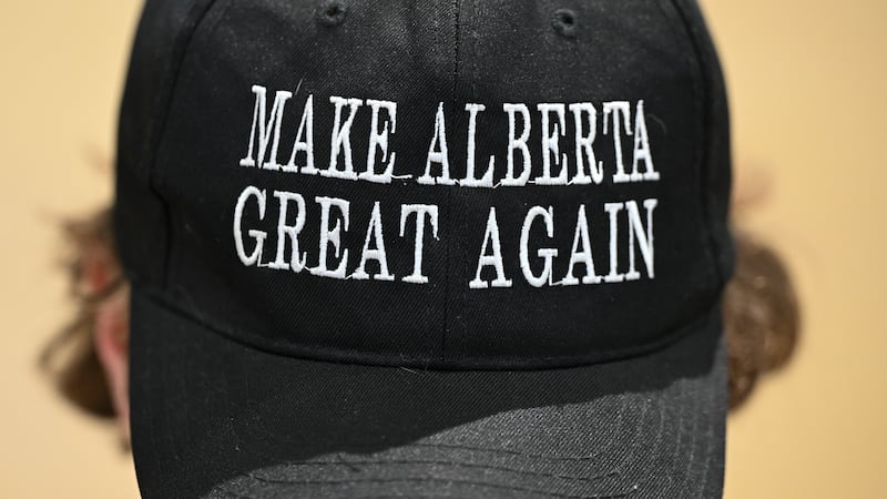 SHERWOOD PARK, CANADA MARCH 18:
A member of the public wears the 'Make Alberta Great Again' hat during the event Help Us Make Sovereignty for Alberta Happen, organized by the Alberta Prosperity Project in Sherwood Park, Strathcona County, Alberta, Canada, on March 16, 2025. (Photo by Artur Widak/NurPhoto via Getty Images)