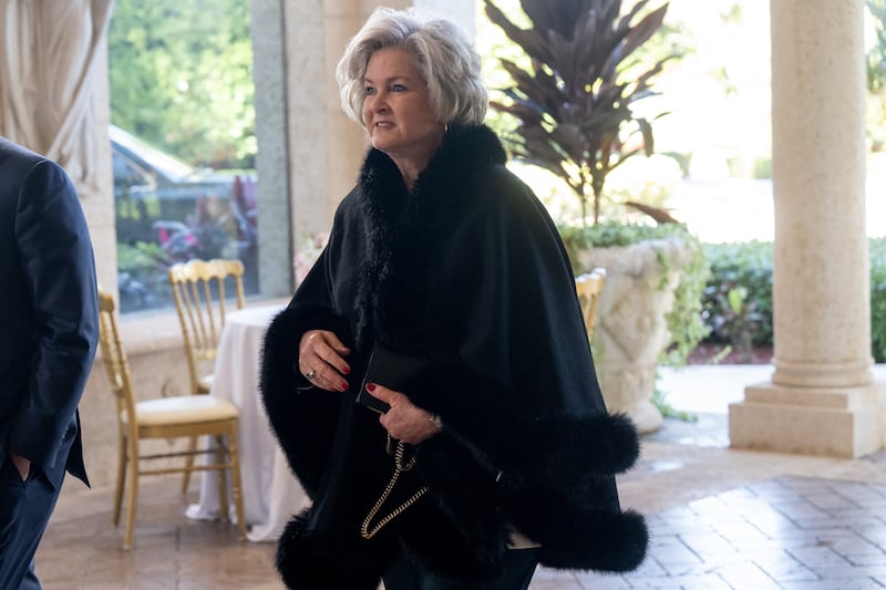 White House Chief of Staff Susie Wiles arrives to attend the wedding of Dan Scavino, White House Deputy Chief of Staff, and Erin Elmore, the Department of State Director of Art in Embassies, at Mar-a-Lago in Palm Beach, Florida, February 1, 2026.