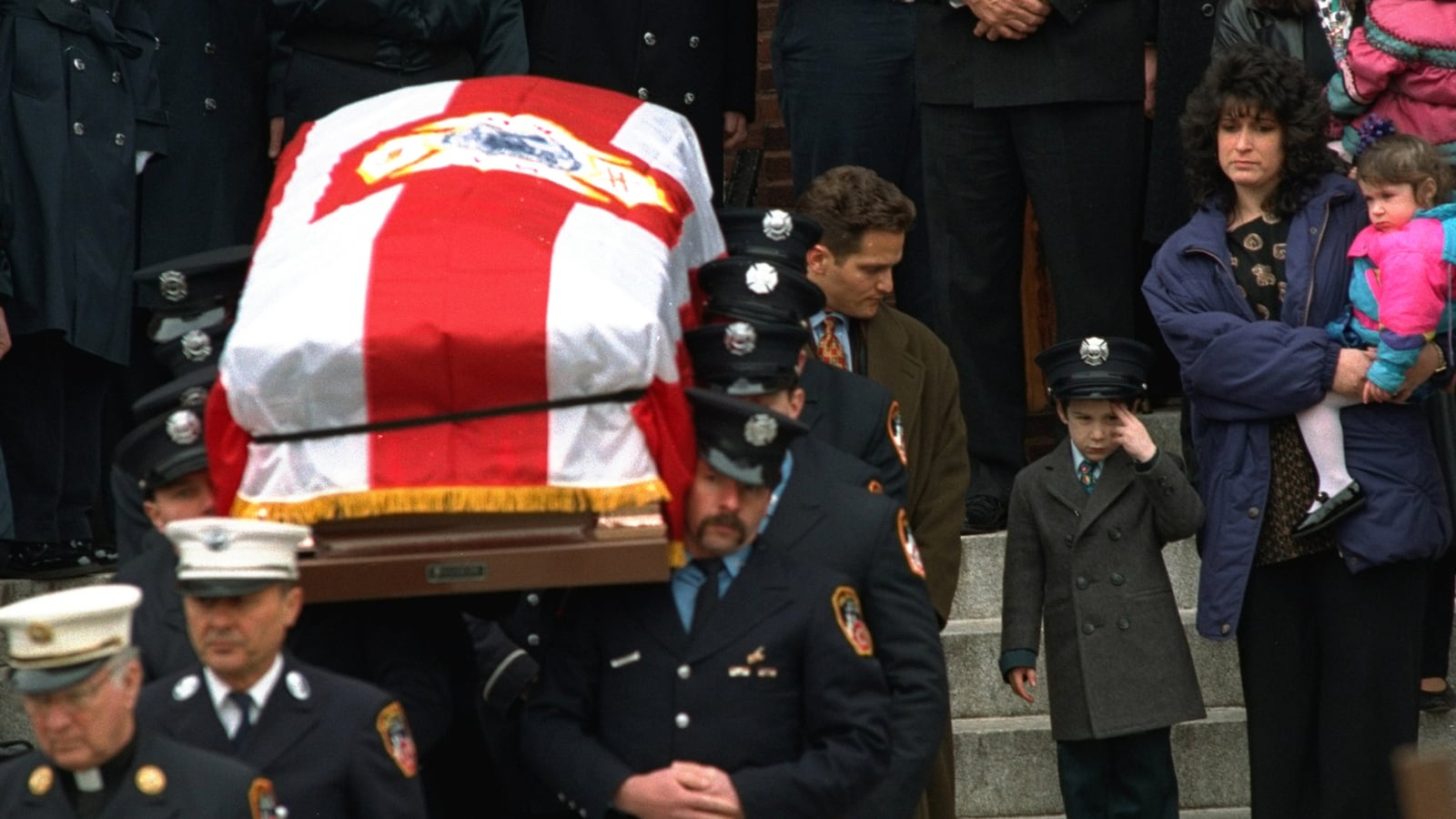 articles/2013/12/10/firefighter-s-son-in-iconic-1995-funeral-photo-follows-his-dad-s-deadly-steps/131209-daly-wylie-tease_svbo6p