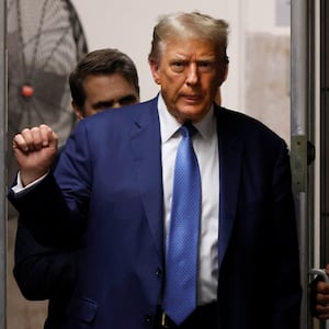 Former U.S. President Donald Trump returns to the courtroom after a short break during his hush money trial at Manhattan Criminal Court in New York City, U.S., 20 May 2024. 