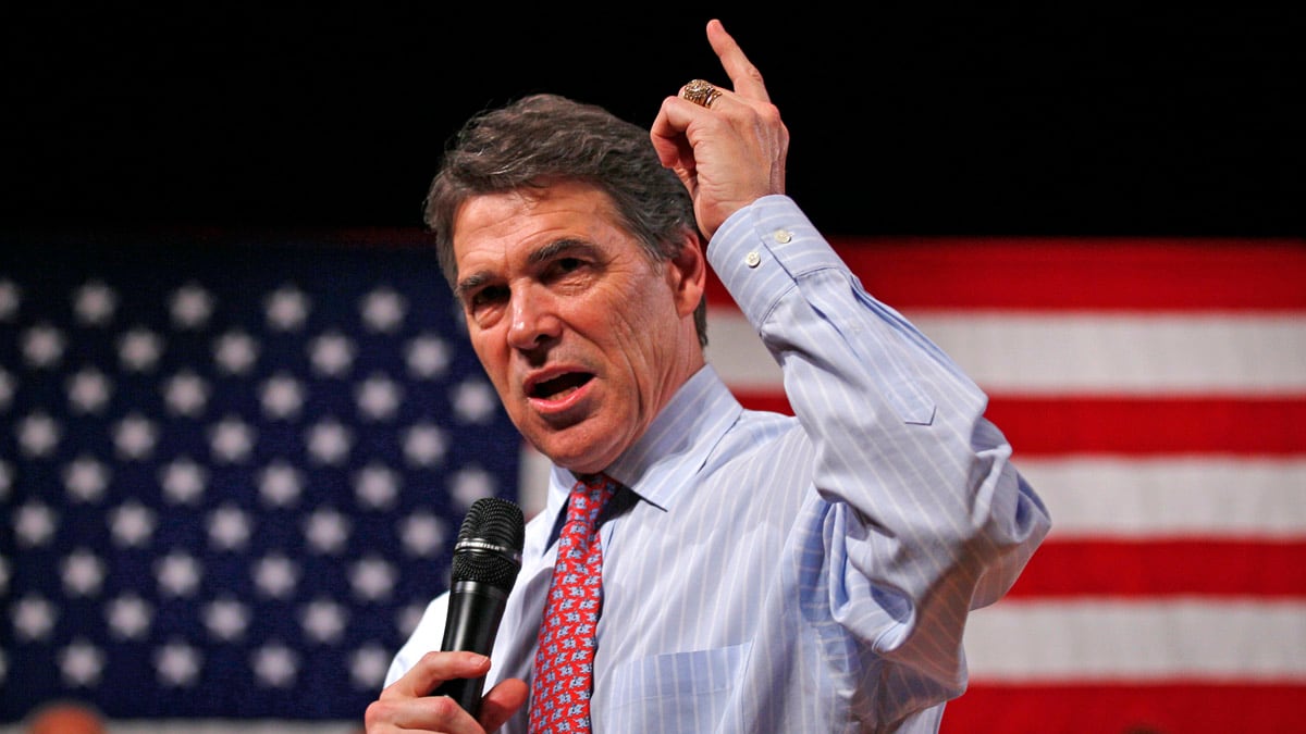 cheats/2011/10/02/cain-perry-s-camp-sign-insensitive/rick-perry-rabbi-barrett_pqoyfx