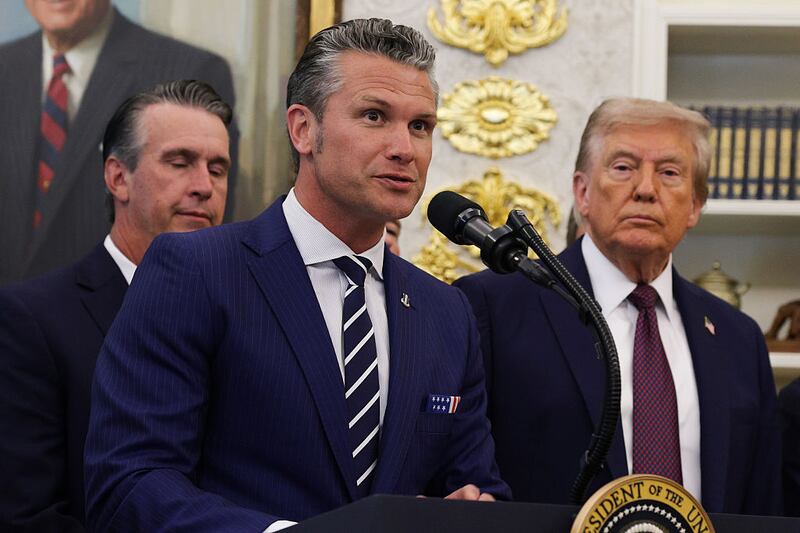 WASHINGTON, DC - SEPTEMBER 02: U.S. Defense Secretary Pete Hegseth speaks as U.S. President Donald Trump looks on in the Oval Office at the White House on September 2, 2025 in Washington, DC. Following days of speculation about his health from users on social media, President Trump made his first public appearance in a week to announce the moving of Space Command headquarters from Colorado to Alabama. (Photo by Alex Wong/Getty Images)