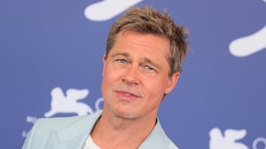 Brad Pitt attends the “Wolfs” photocall with a clean cut hairstyle during the 81st Venice International Film Festival in 2024.