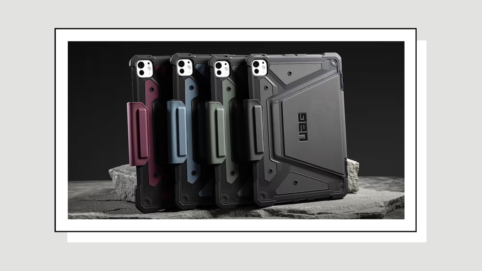 Urban Armor Gear iPad cases on slate slab.