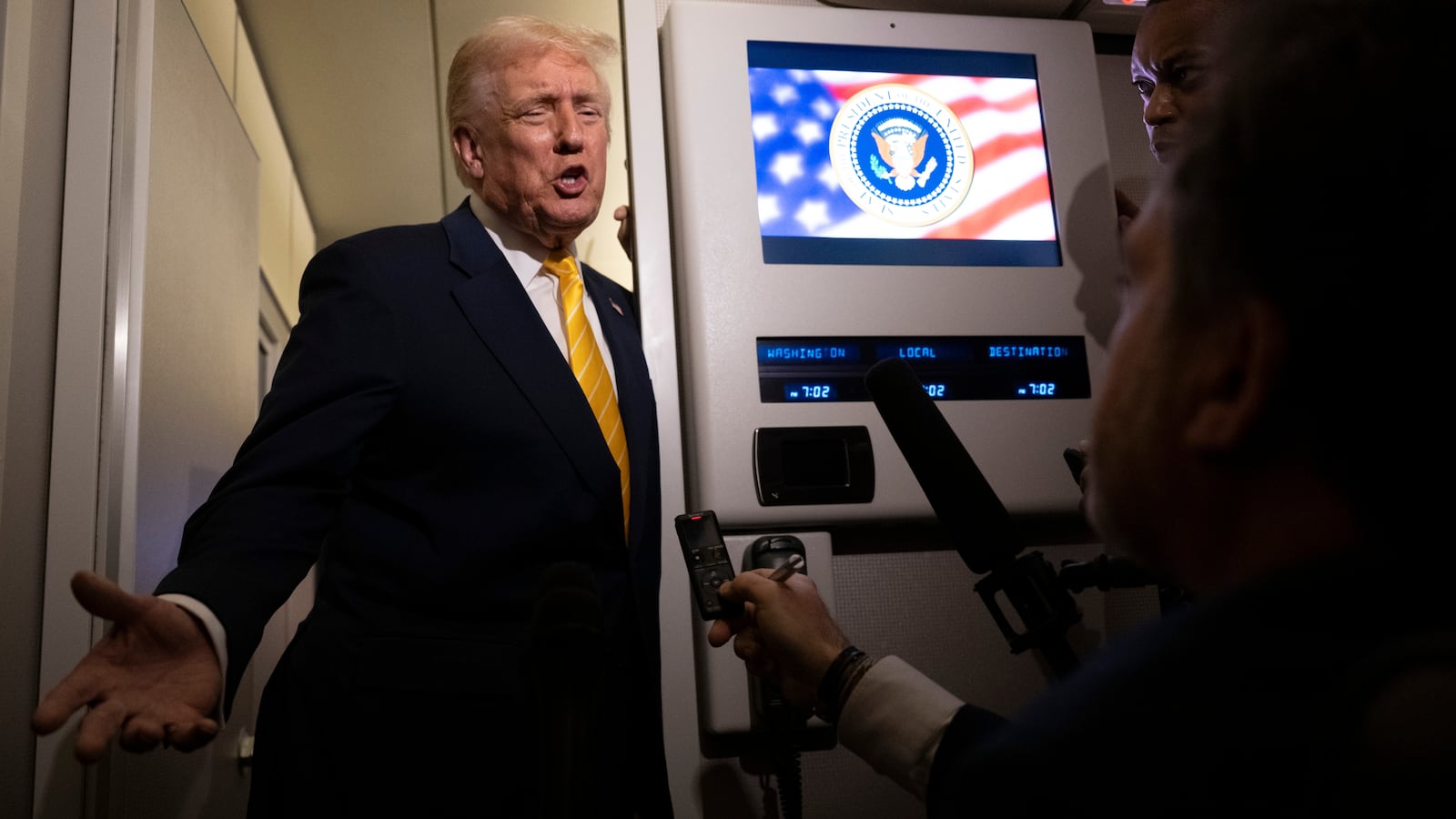 IN FLIGHT - NOVEMBER 14: U.S. President Donald Trump speaks to members of press aboard Air Force One on November 14, 2025 while in flight from Washington, DC to West Palm Beach International Airport. Trump is scheduled to spend the weekend at his Mar-A-Lago estate in Palm Beach, Florida. (Photo by Roberto Schmidt/Getty Images)