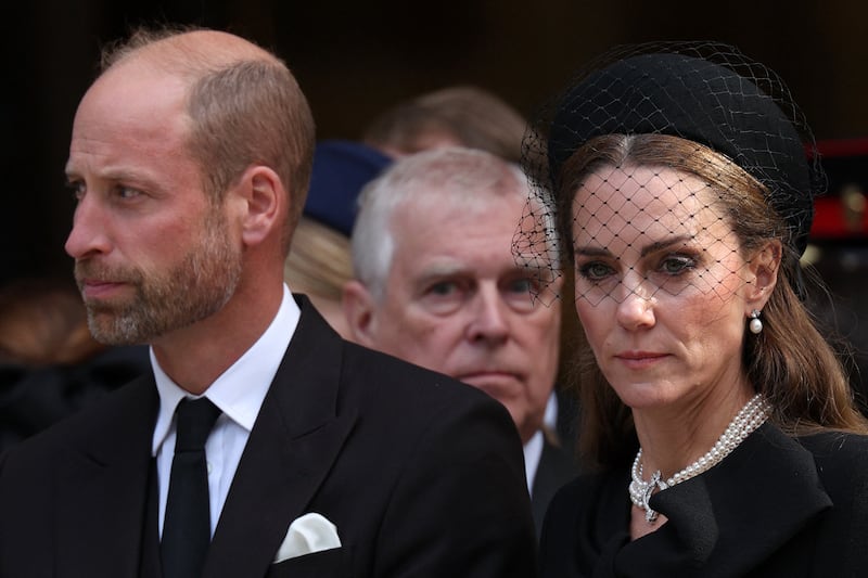 Britain's Prince William, Prince of Wales (L), Britain's Prince Andrew, Duke of York (C) and Britain's Catherine, Princess of Wales leave following a Requiem Mass, a Catholic funeral service, for the late Katharine, Duchess of Kent, at Westminster Cathedral in London on September 16, 2025. Britain's Duchess of Kent, known for her links to the Wimbledon tennis tournament and for anonymously teaching music at a primary school. The duchess, a talented pianist, organist and singer, was born Katharine Worsley into an aristocratic family in Yorkshire, northern England.