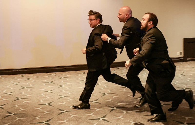House Speaker Mike Johnson (R-LA) is evacuated as a shooter opens fire during the annual White House Correspondents' Association dinner in Washington, D.C., U.S., April 25, 2026.