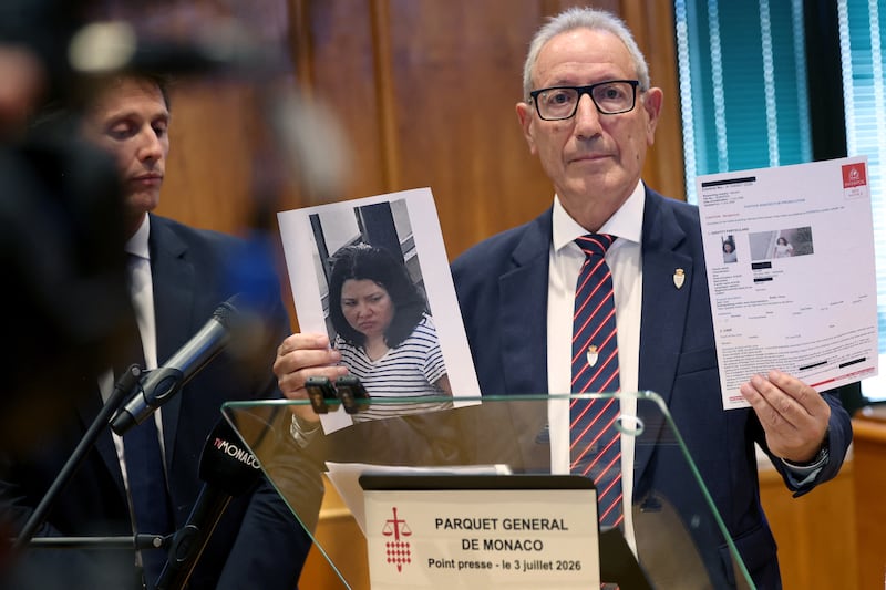 Monaco's Public Safety director Eric Arella holds up the red notice issued by Interpol against a Ukrainian woman suspected of planting a bomb in Monaco that injured three people, including a Ukrainian-born tycoon, during a press conference in Monaco on July 3, 2026. Identified as Anastasiia Berezovska, 39, the suspect is wanted in Monaco for attempted murder, placing an explosive device on a public road with criminal intent, and criminal conspiracy, according to the notice. The bombing has sent shockwaves through Monaco, an ultra-secure microstate near Nice in southern France that is a playground of the world's ultra-rich (Photo by Valery HACHE / AFP via Getty Images)