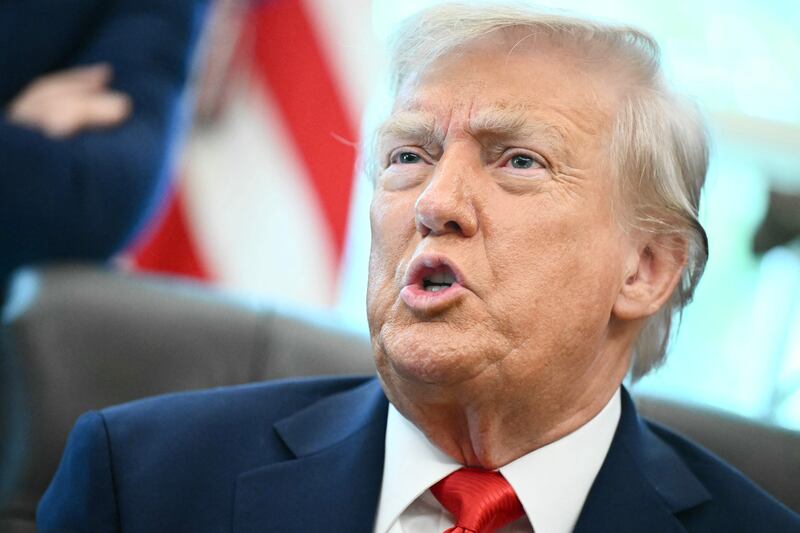 US President Donald Trump speaks to the press after signing an executive order that aims to end cashless bail, in the Oval Office of the White House in Washington, DC on August 25, 2025.