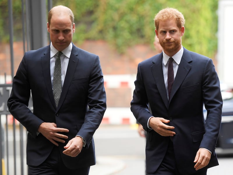 Britain's Prince William and Prince Harry arrive to visit the Support4Grenfell Community Hub in London on September 5, 2017.
