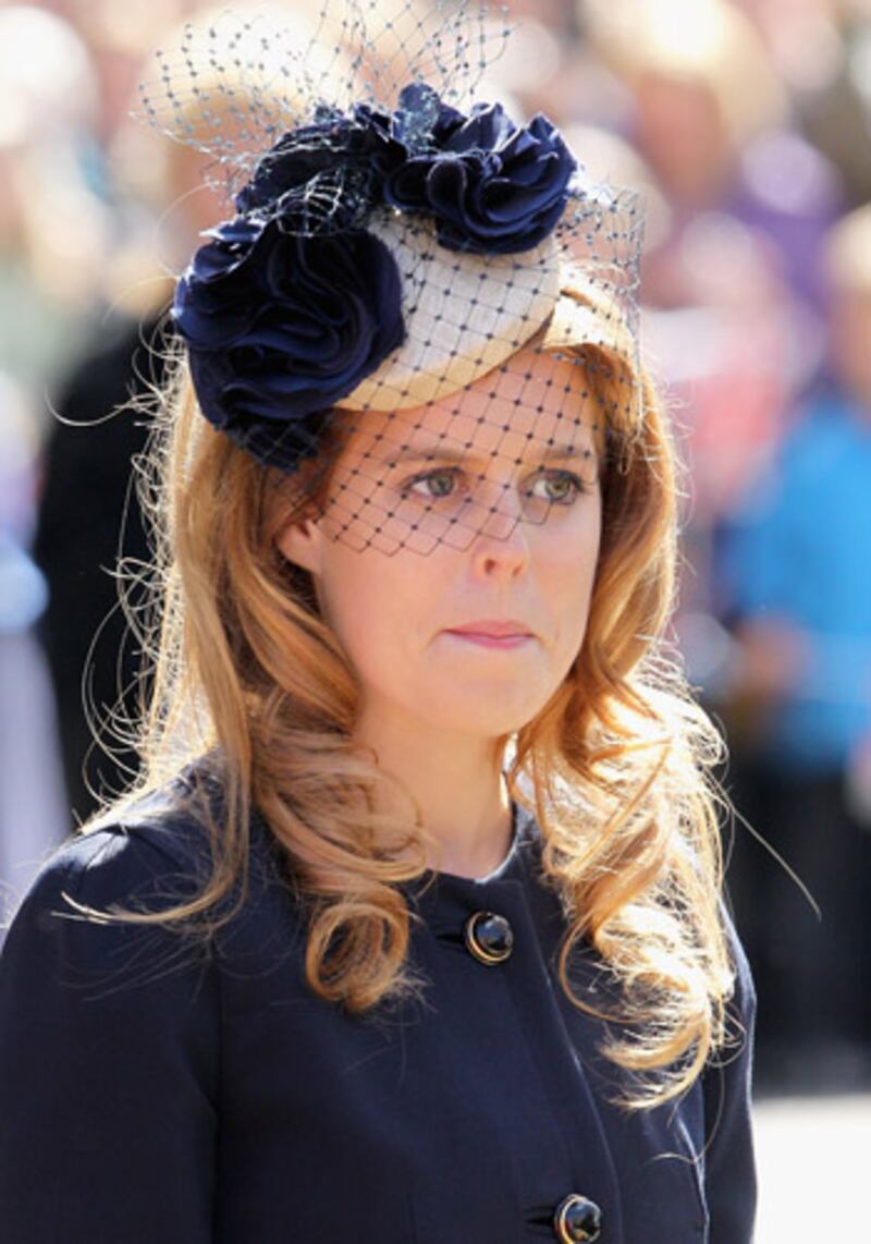 articles/2012/04/05/queen-philip-and-beatrice-distribute-maundy-money/royalist-maundy3_c8m4ah