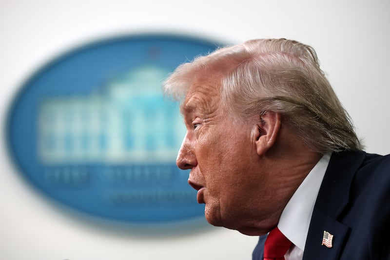 President Donald Trump takes questions from the media during a press briefing in the James S. Brady Press Briefing Room of the White House on January 20, 2026 in Washington, DC.