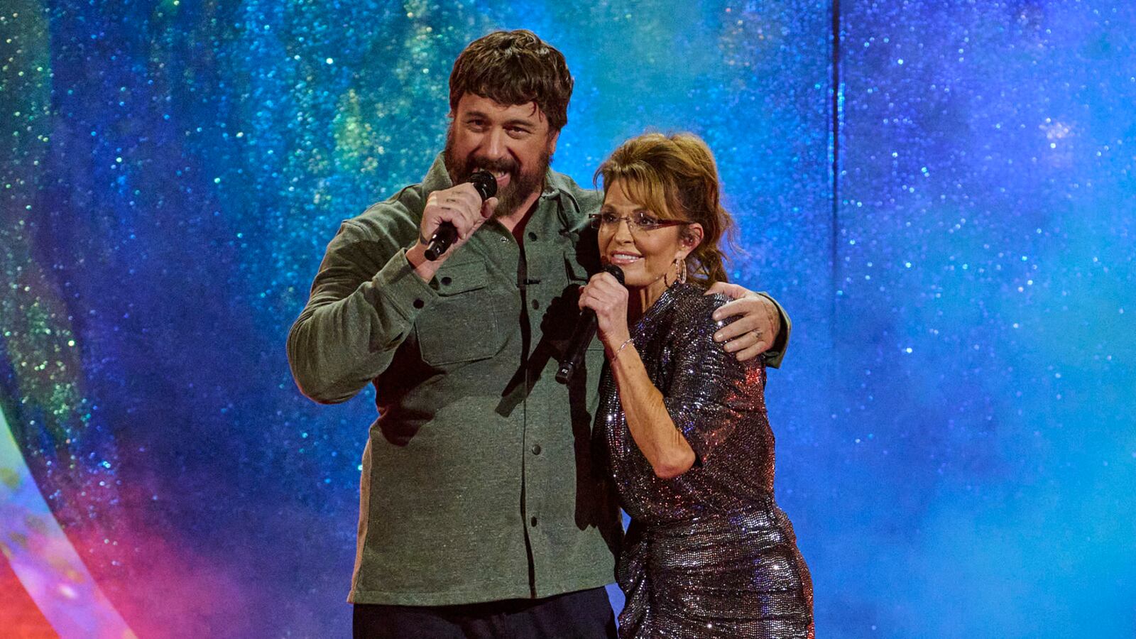 Sarah Palin and her cousin JD perform on “We Are Family”
