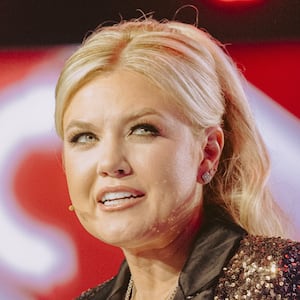 Turning Point USA CEO Erika Kirk, widow of late right-wing political activist Charlie Kirk, speaks during Turning Point's annual AmericaFest conference in Phoenix, Arizona on December 18, 2025. (Photo by Olivier Touron / AFP via Getty Images)