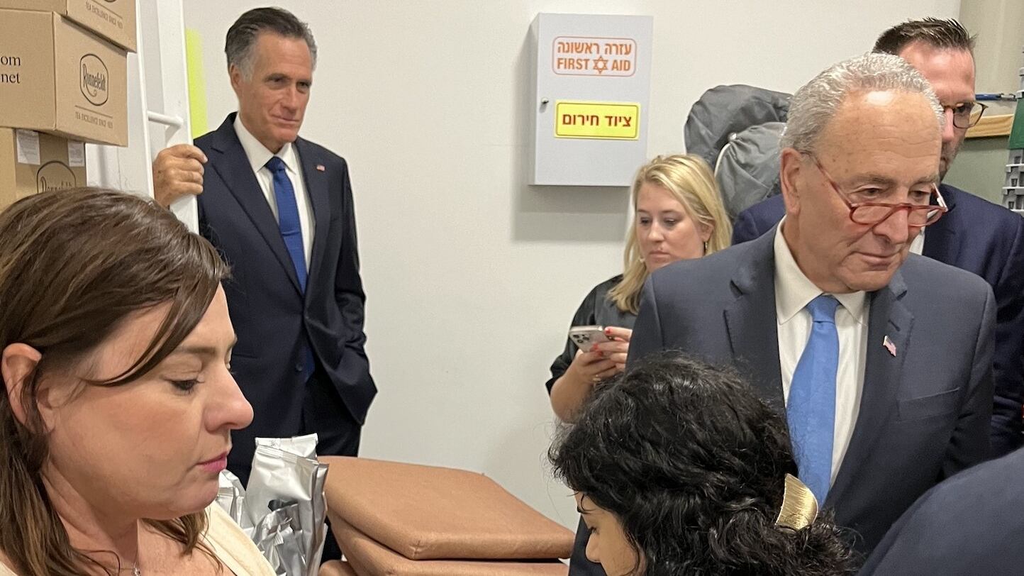 Chuck Schumer and Mitt Romney take cover from a Hamas rocket attack