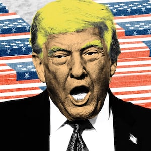 Donald Trump in front of coffins draped with American flags