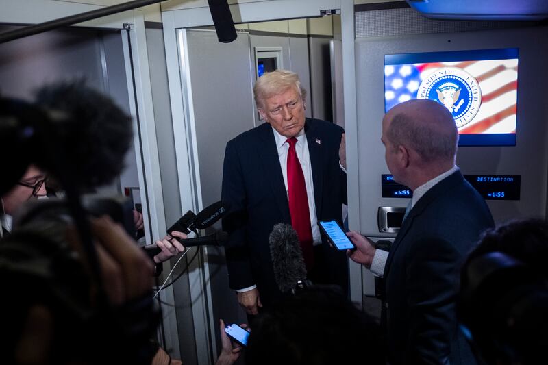 IN FLIGHT - NOVEMBER 25: President Donald Trump speaks to the media aboard Air Force One on November 25, 2025 in flight en route to Florida. The Trumps are traveling to Mar-a-Lago in Palm Beach, Florida for the Thanksgiving holiday. (Photo by Pete Marovich/Getty Images)