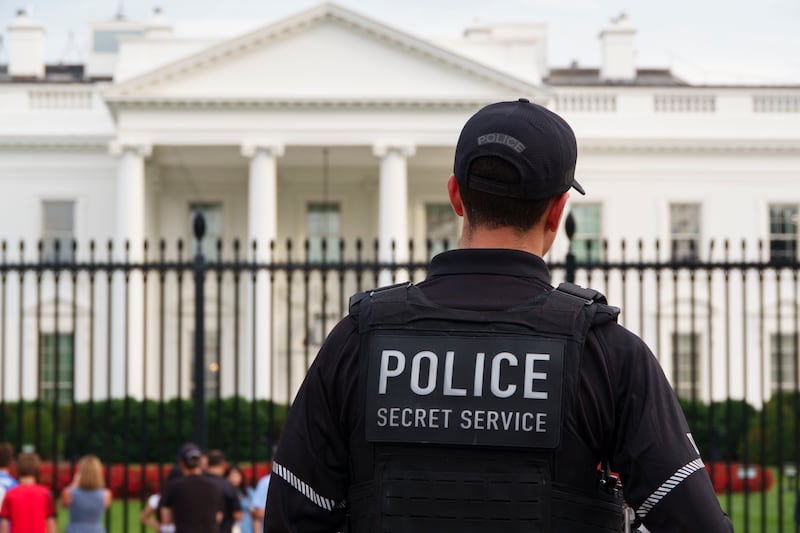WASHINGTON, DC - JUNE 22: A U.S. Secret Service police officer stands outside of the White House the day after President Donald Trump announced U.S. military strikes on nuclear sites in Iran on June 22, 2025 in Washington, DC. (Photo by Kevin Carter/Getty Images)