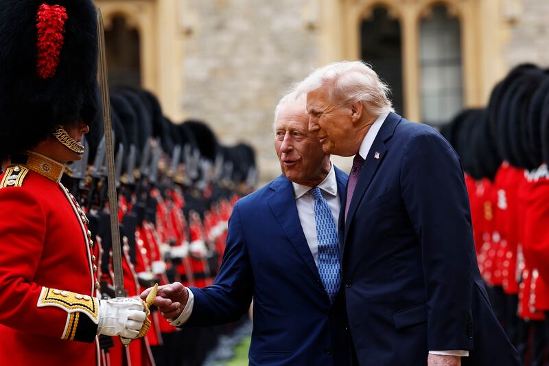 King Charles III and U.S. President Donald Trump inspect the troops at Windsor Castle