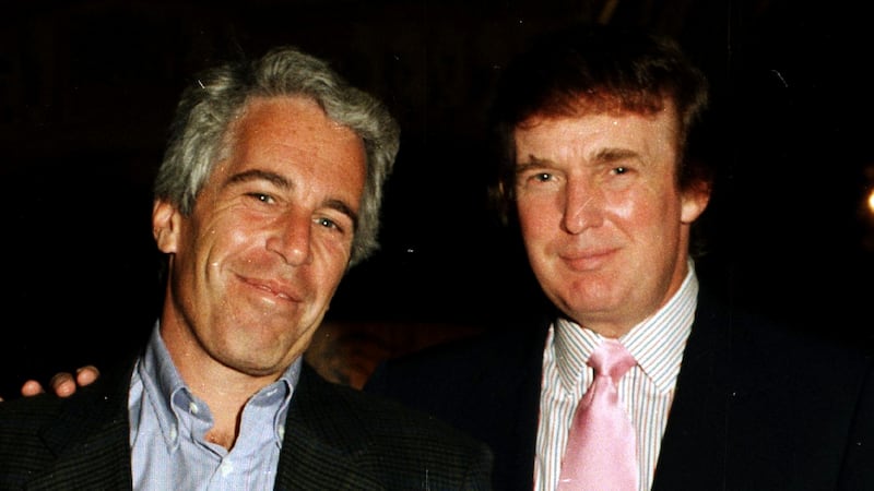 Portrait of American financier Jeffrey Epstein (left) and real estate developer Donald Trump as they pose together at the Mar-a-Lago estate, Palm Beach, Florida on February 22, 1997. (Photo by Davidoff Studios/Getty Images)