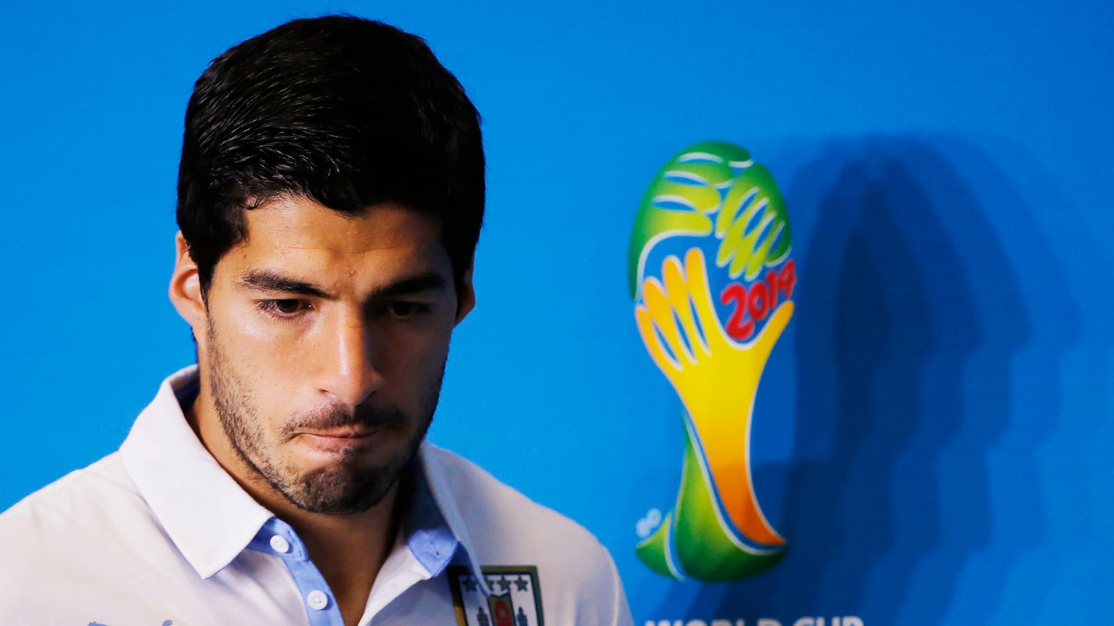 cheats/2014/06/26/uruguay-s-suarez-banned-for-biting/140626-luis-suarez-cheat_ta54i3