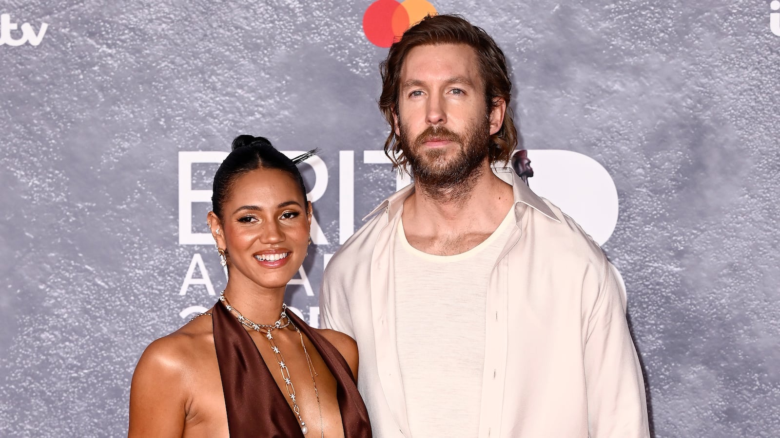 Vick Hope and Calvin Harris attend The BRIT Awards 2025 at the InterContinental London - The O2 on March 01, 2025 in London, England.
