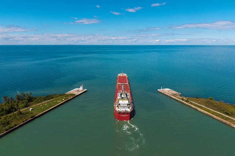 FILE PHOTO: A drone view of the bulk carrier Rt. Hon. Paul J. Martin leaving the Welland Canal, which links Lake Ontario and Lake Erie entirely within the Canadian province of Ontario, and entering Lake Ontario, a day after U.S. President Donald Trump signed an executive order renaming Lake Ontario as "Lake America," in St. Catharines, Ontario, Canada, August 28, 2026. REUTERS/Carlos Osorio/File Photo