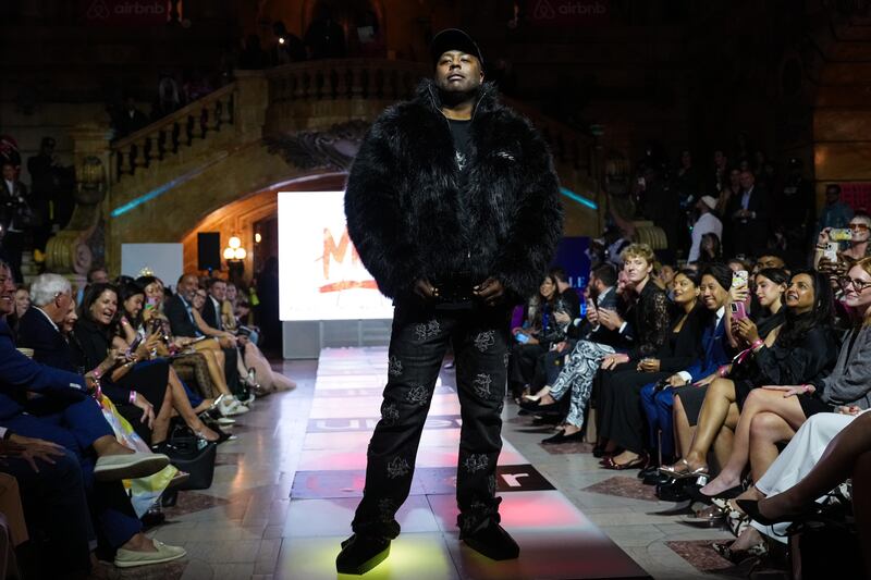 Kaz Daughtry wore a faux black fur coat and shoes reminiscent of Kanye West's Yeezy line.