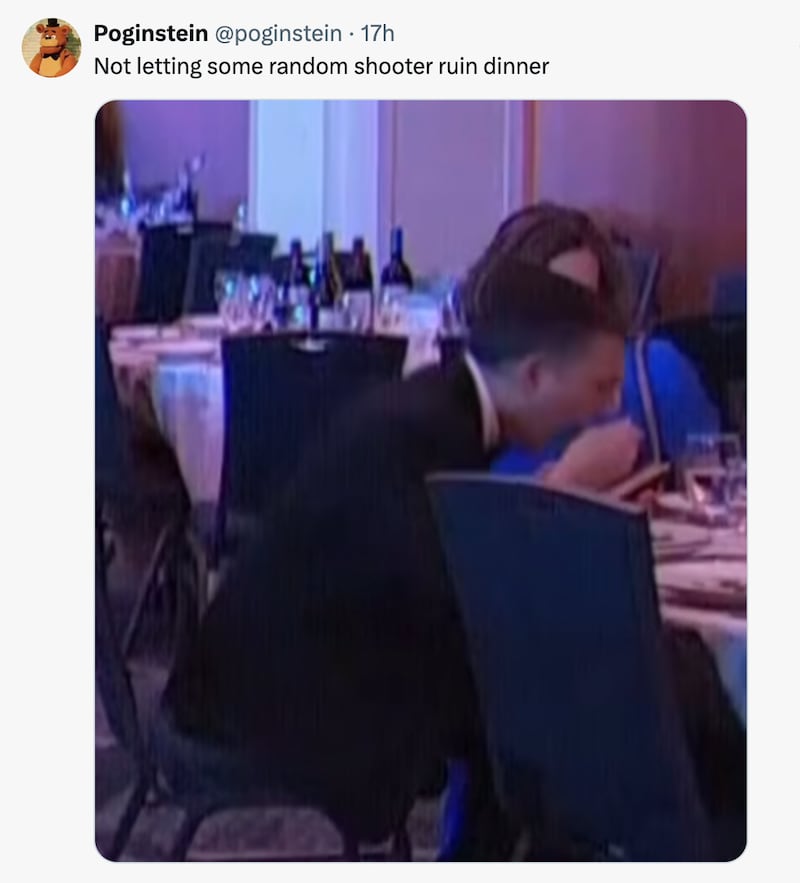 A man continues eating at the WHCA dinner after an attempted shooting.