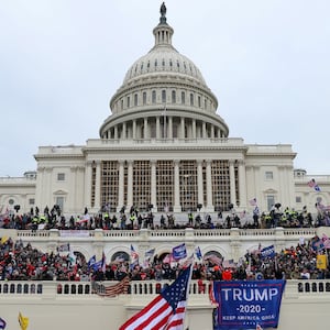 US President Donald Trump's supporters gather outside the Capitol building.