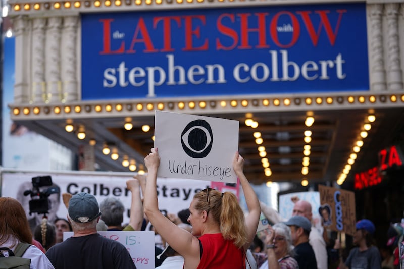 People protest after CBS/Paramount announced the cancellation of The Late Show with Stephen Colbert outside the Ed Sullivan Theater, in New York City, U.S., July 21, 2025.