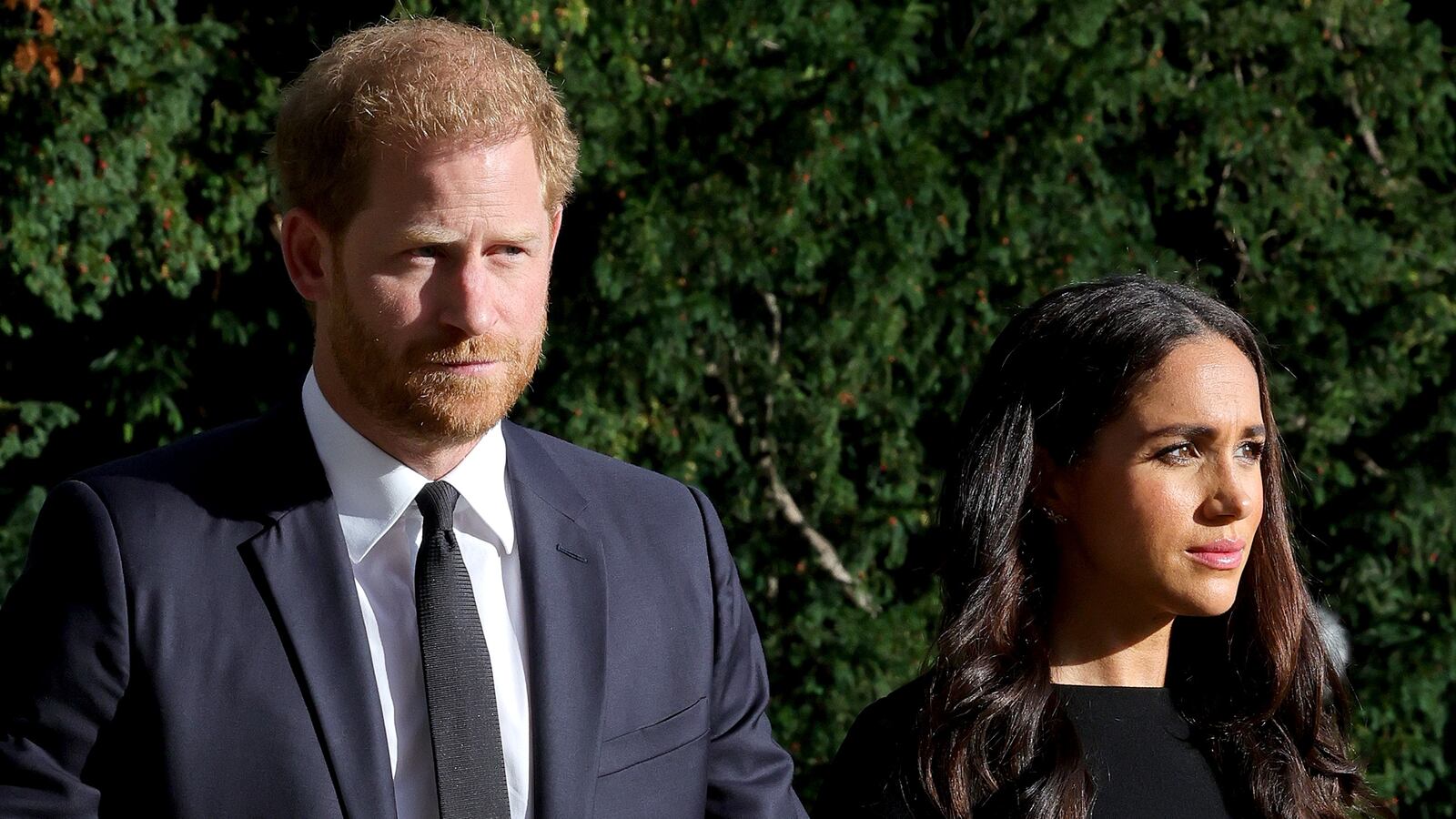 WINDSOR, ENGLAND - SEPTEMBER 10: Prince Harry, Duke of Sussex, and Meghan, Duchess of Sussex on the long Walk at Windsor Castle arrive to view flowers and tributes to HM Queen Elizabeth on September 10, 2022 in Windsor, England.