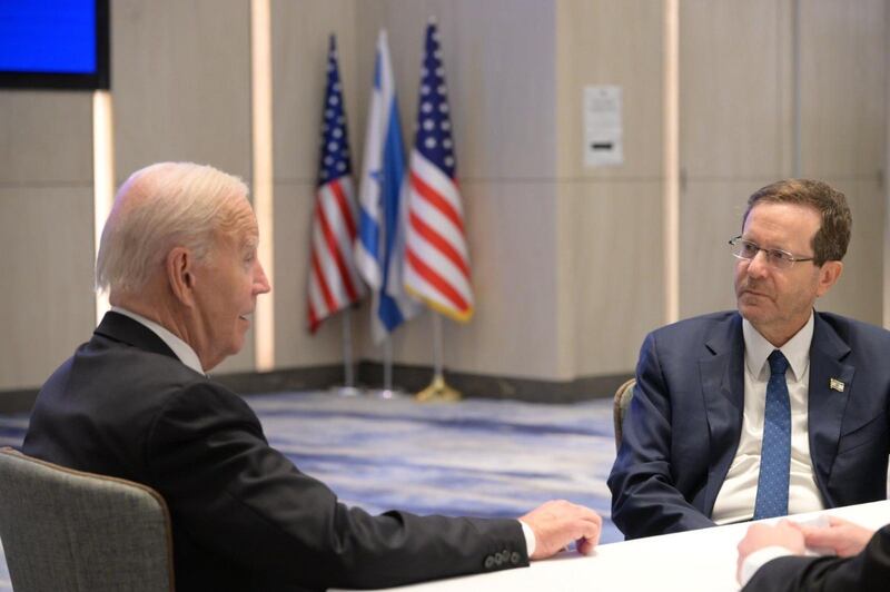 A photo including US President Joe Biden and Israeli President Isaac Herzog meeting in Tel Aviv