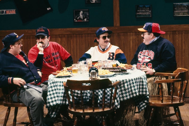 Chris Farley as Todd O'Connor, Robert Smigel as Carl Wollarski, Mike Myers as Pat Arnold, George Wendt as Bob Swerski during "Bill Swerski's Super Fans" skit