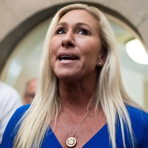 Rep. Marjorie Taylor Greene, R-Ga., talks with reporters in the U.S. Capitol on Tuesday, May 7, 2024.